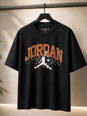 Jordan Black Graphic Tee with Orange Lettering and Multicolor Stars